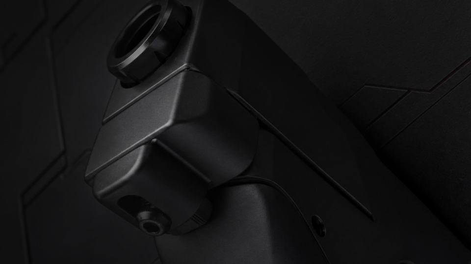 Adjustable spring latch on the PRINT-FORCE TP50 Compact compensator